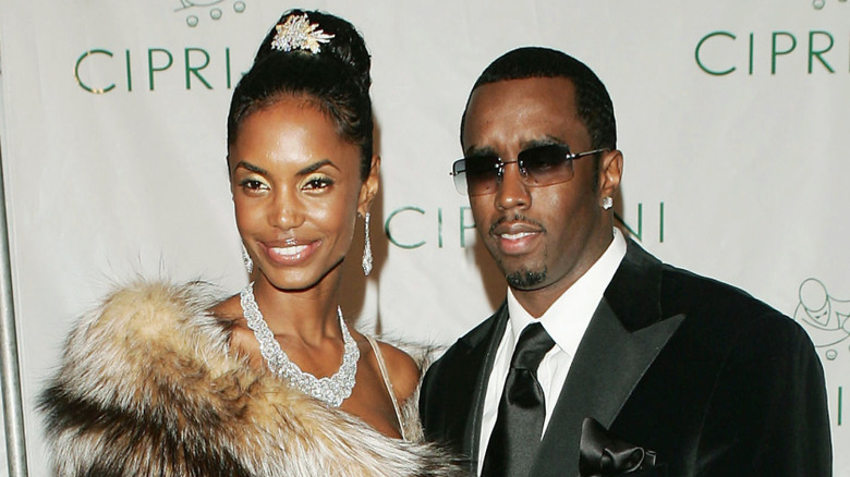 Kim Porter and Diddy posing