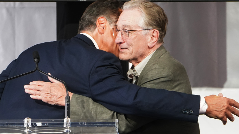 Andrew Cuomo hugs Robert De Niro