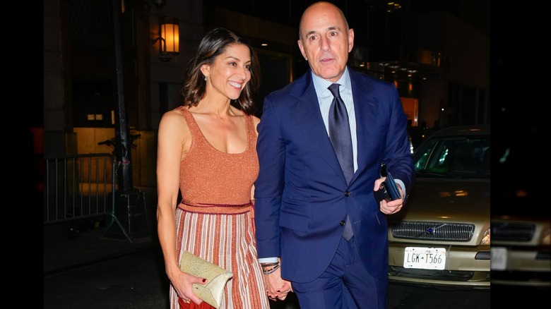 Shamin Abas holding hands with Matt Lauer