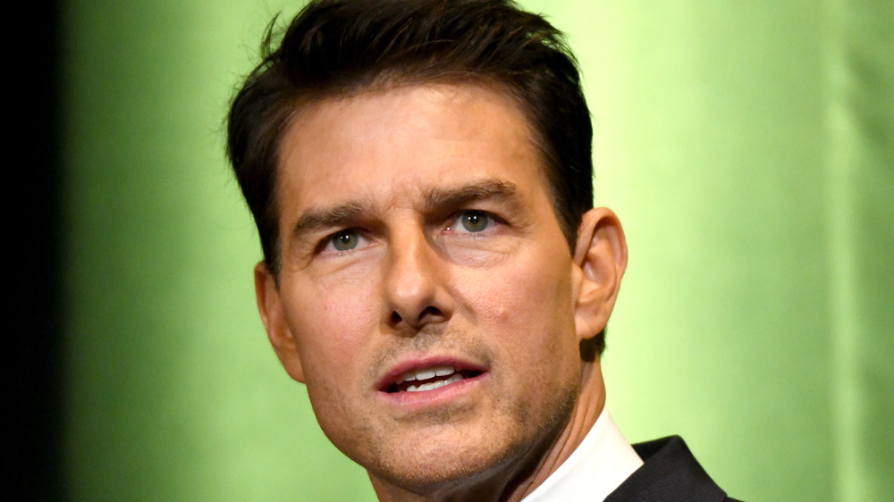 Tom Cruise looking past camera