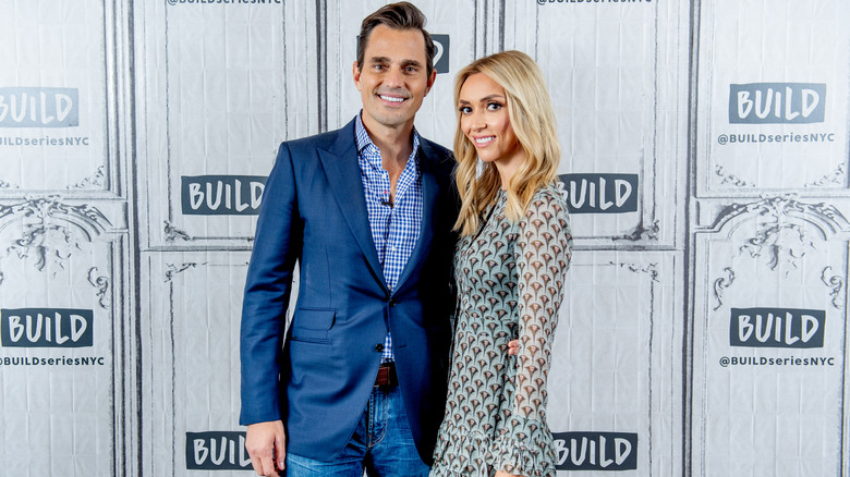 Giuliana Rancic and Bill Rancic posing