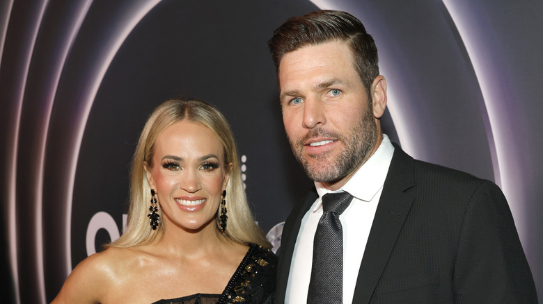 Carrie Underwood and Mike Fisher at Opry 100
