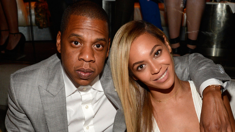 Jay-Z and Beyonce pose for a photo