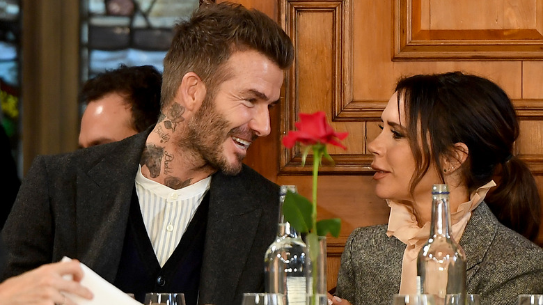 David and Victoria Beckham talking