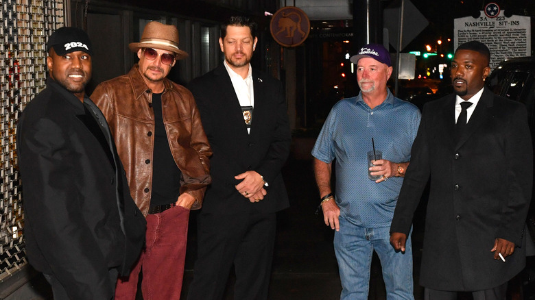 Kanye West laughing with Kid Rock and Ray J
