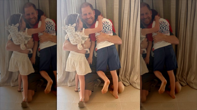 Prince Harry hugs Prince Archie and Princess Lilibet