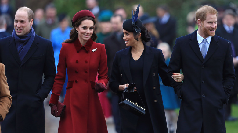 William, Kate, Meghan, and Harry walking