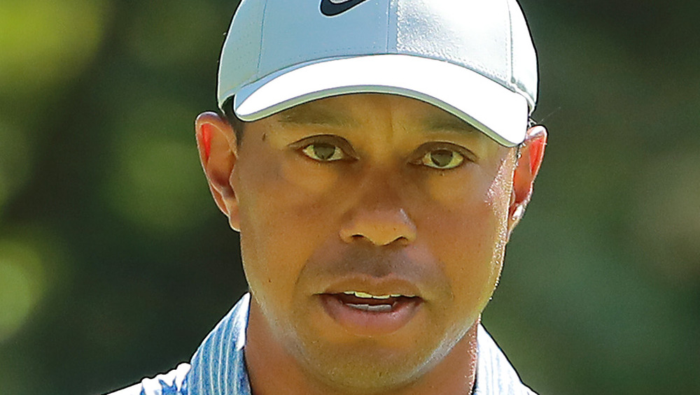 Tiger Woods waving at the crowd