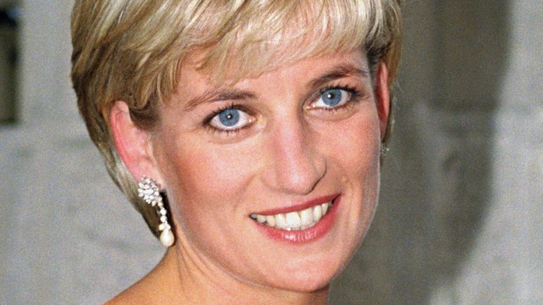 Princess Diana smiling and looking up