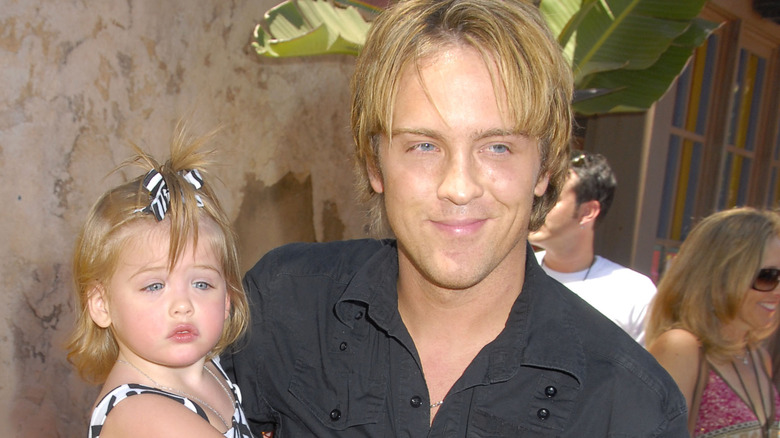 Larry Birkhead holding Dannielynn Birkhead