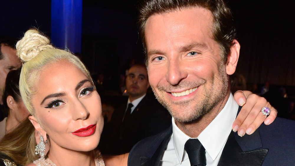 Lady Gaga and Bradley Cooper at an event 