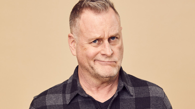 Dave Coulier short grey stubble