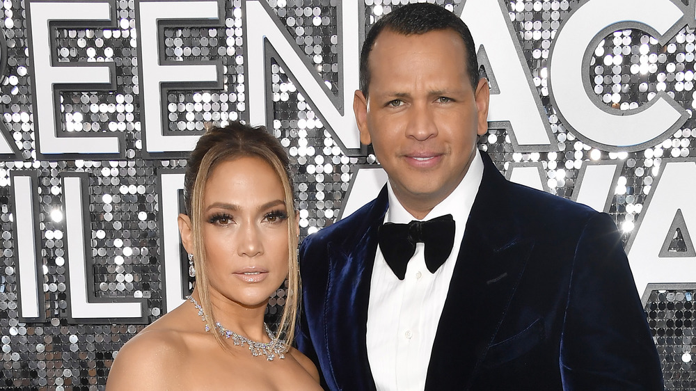 Jennifer Lopez and Alex Rodriguez posing on red carpet