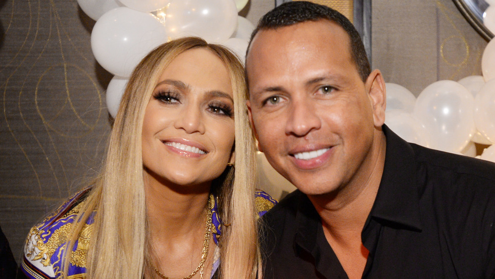 Jennifer Lopez and Alex Rodriguez smiling