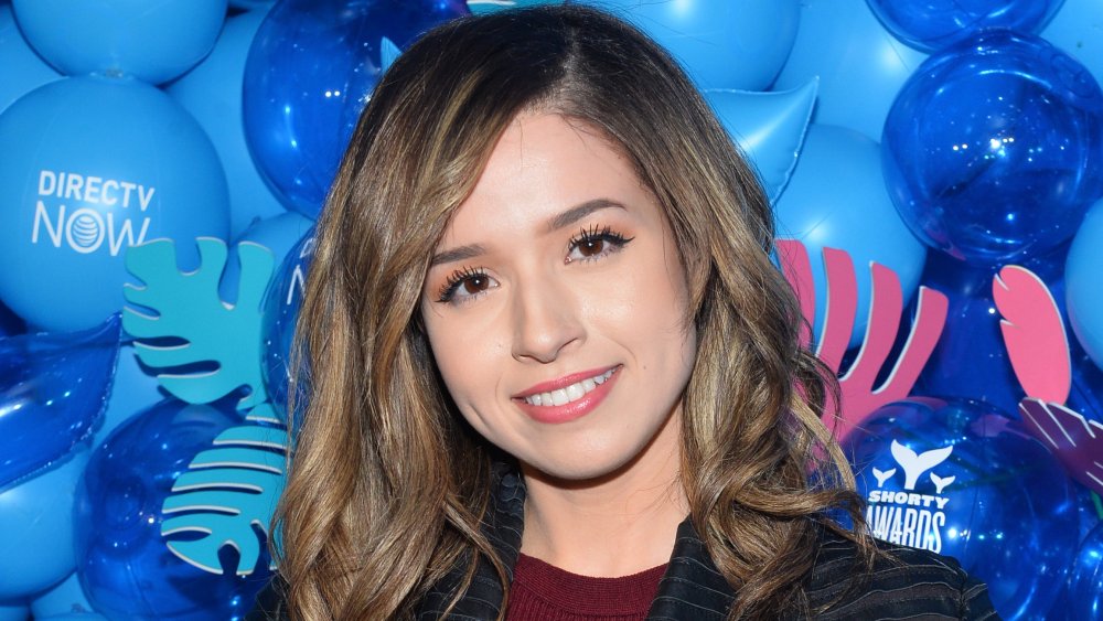 Pokimane poses with the award for Twitch Streamer of the Year during the 10th Annual Shorty Awards