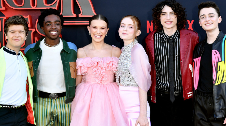 Gaten Matarazzo, Caleb McLaughlin, Millie Bobby Brown, Sadie Sink, Finn Wolfhard, and Noah Schnapp attend the premiere of Netflix's "Stranger Things" Season 3
