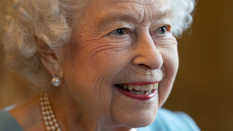 Queen Elizabeth II smiles