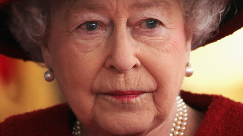 Queen Elizabeth looking sad
