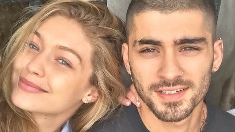 Yolanda Hadid, Gigi Hadid, and Zayn Malik posing