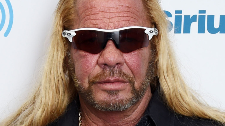 Dog the Bounty Hunter poses for a photo