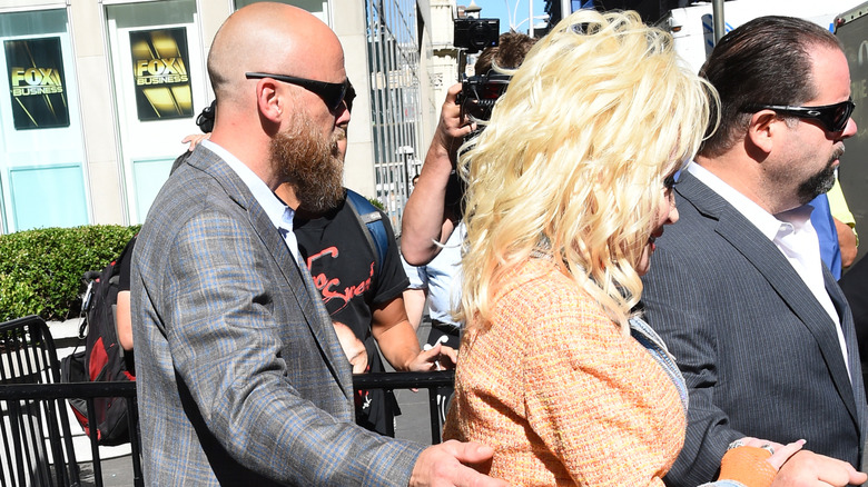 Bryan Seaver escorting Dolly Parton in 2016.