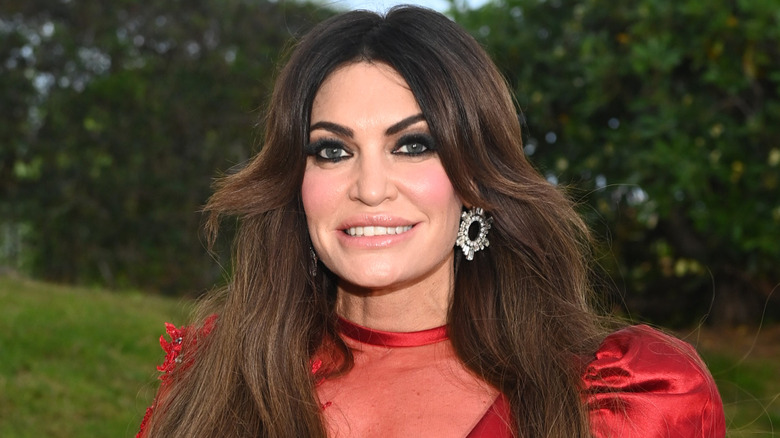 Kimberly Guilfoyle posing at amfAR gala