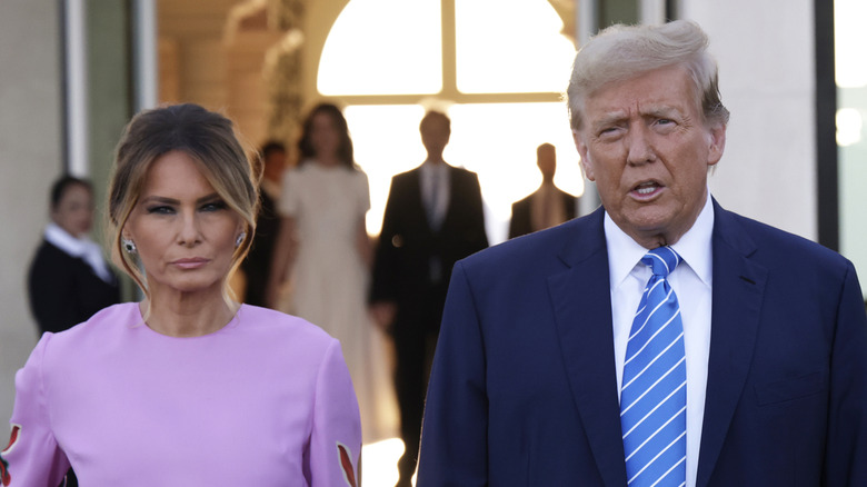 Melania looks stern standing next to Donald Trump during 2024 campaign fundraiser
