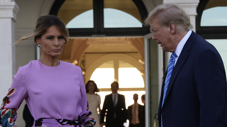 Donald Trump turning toward Melania Trump