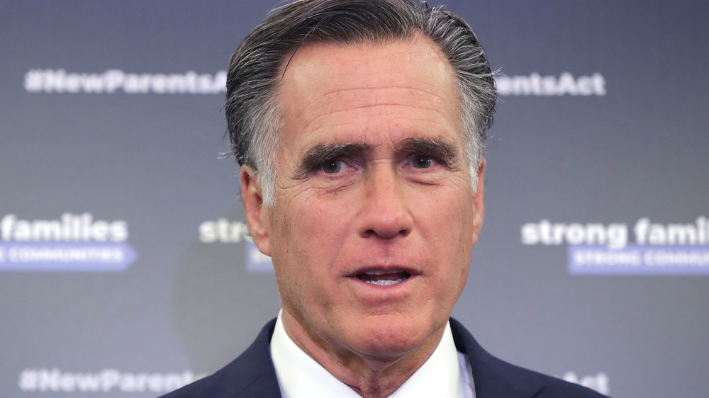 Mitt Romney speaking to reporters