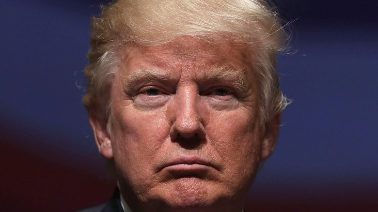 Republican presidential nominee Donald Trump pauses during a campaign event