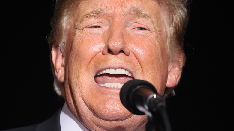 Former President Donald Trump speaks to followers at Iowa State Fairgrounds on October 09, 2021