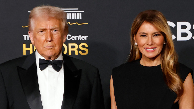 Donald Trump and Melania Trump posing on the red carpet
