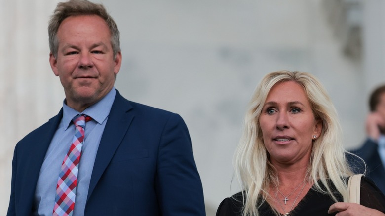 Brian Glenn and Marjorie Taylor Greene exit the Capitol