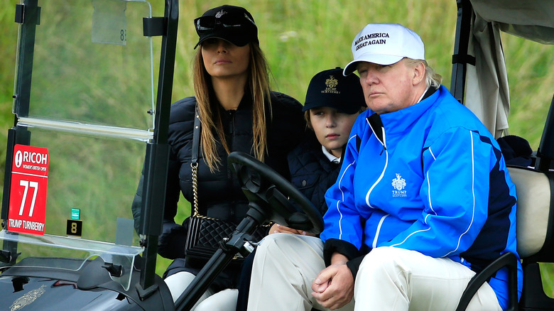 Donald Trump watches the action with wife Melania and son Barron during the Third Round of the Ricoh Women's British Open at Turnberry Golf Club on August 1, 2015.