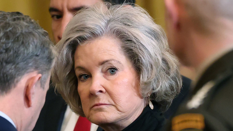 Susie Wiles looking off into the distance