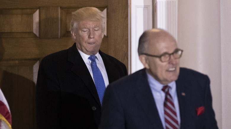 Rudy Giuliani and Donald Trump at a golf club