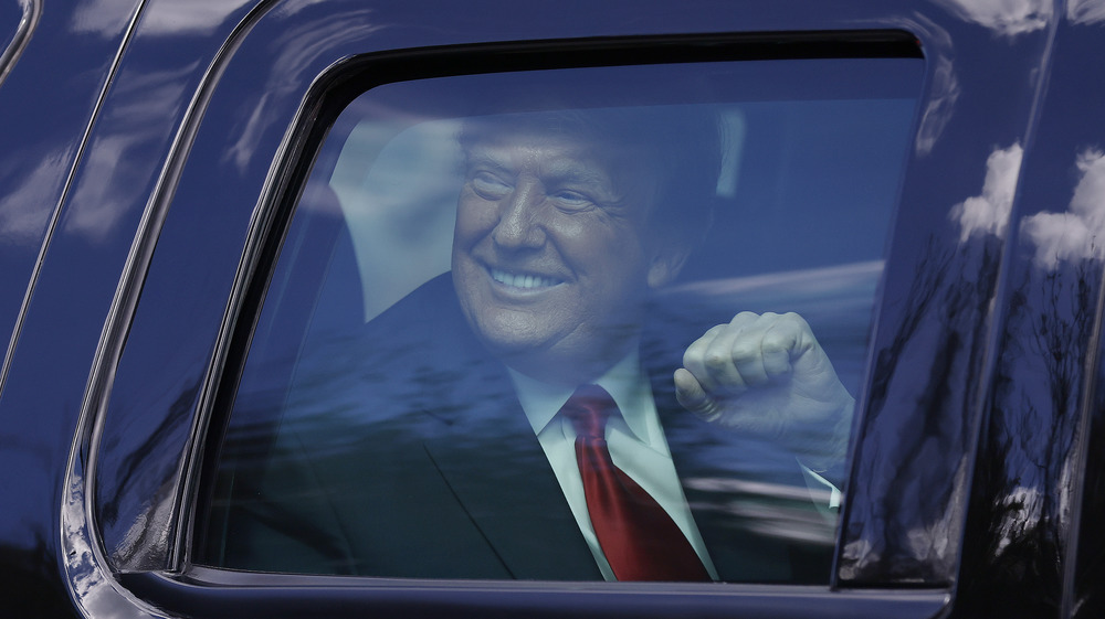 Former President Donald Trump in a vehicle