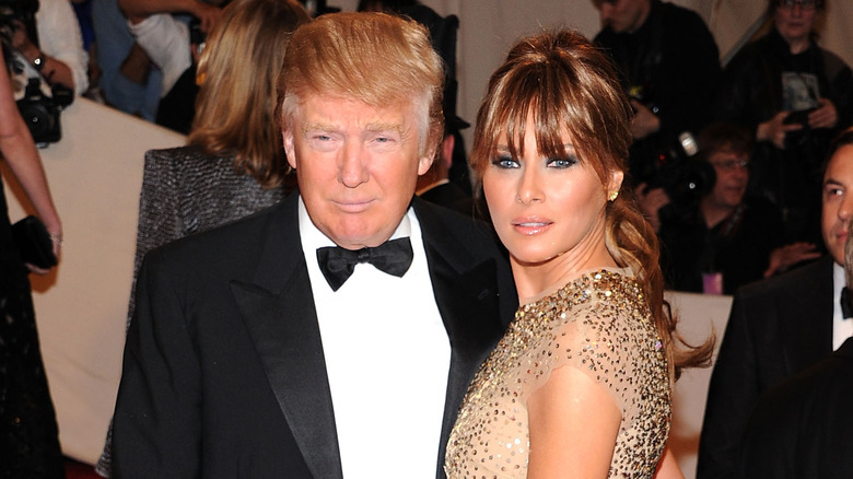 Donald and Melania Trump posing Met Gala