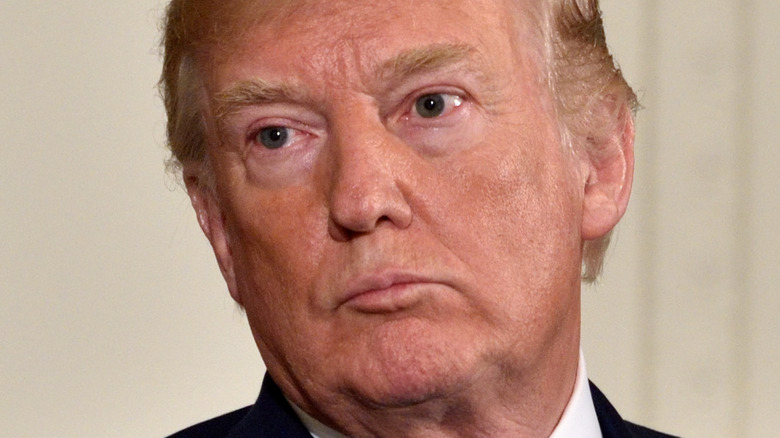 Donald Trump orange tan lips pursed