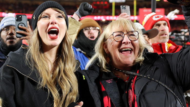 Taylor Swift and Donna Kelce celebrating at a Kansas City Chiefs game