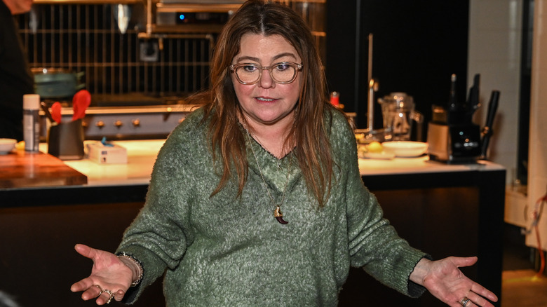 Rachael Ray shrugging