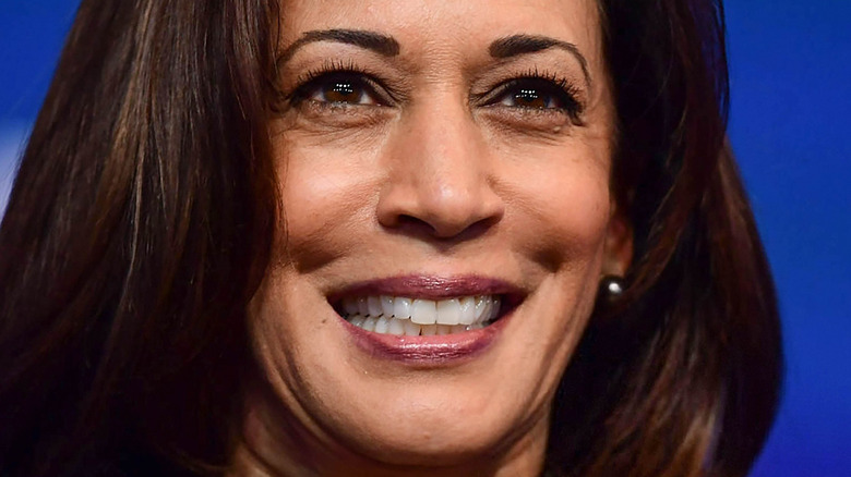 Kamala Harris smiles at an event