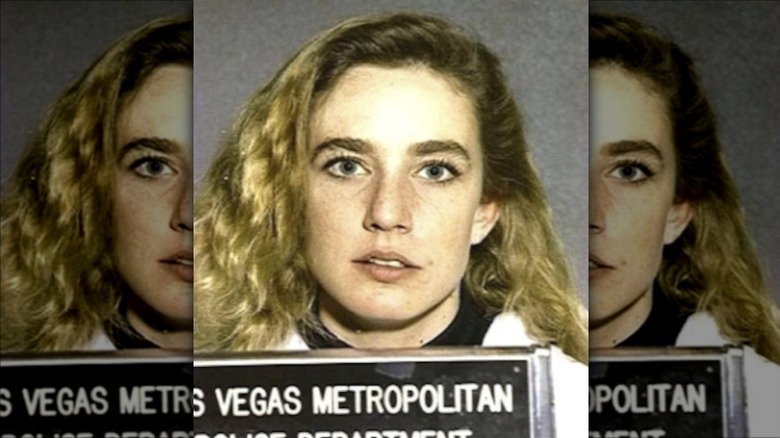 Dana Plato posing for mug shot