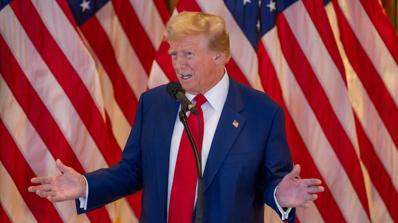 Donald Trump speaking with arms out