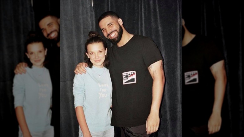 Millie Bobby Brown posing with Drake