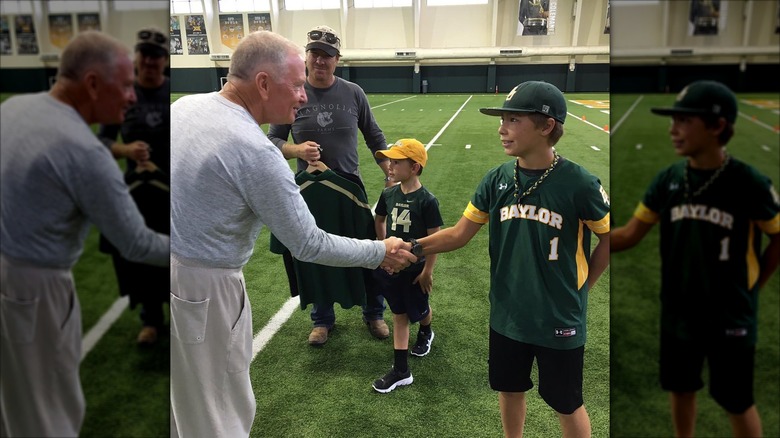 Drake Gaines shaking hands with Baylor University's former head coach