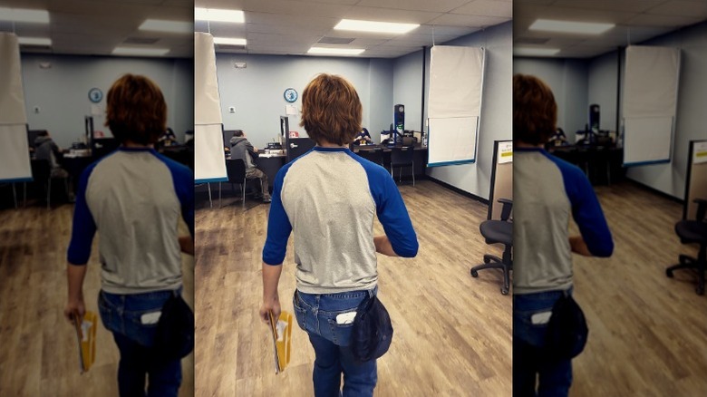 Drake Gaines walks to get his driver's license
