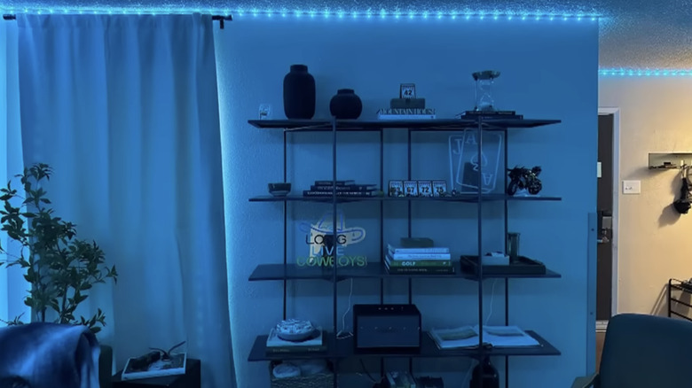 Screenshot of Drake Gaines' dorm drenched in blue LED lights