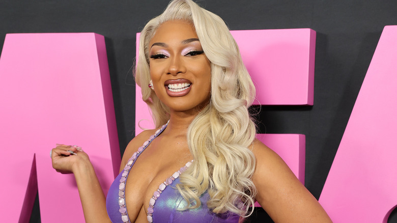 Megan Thee Stallion smiling at red carpet event
