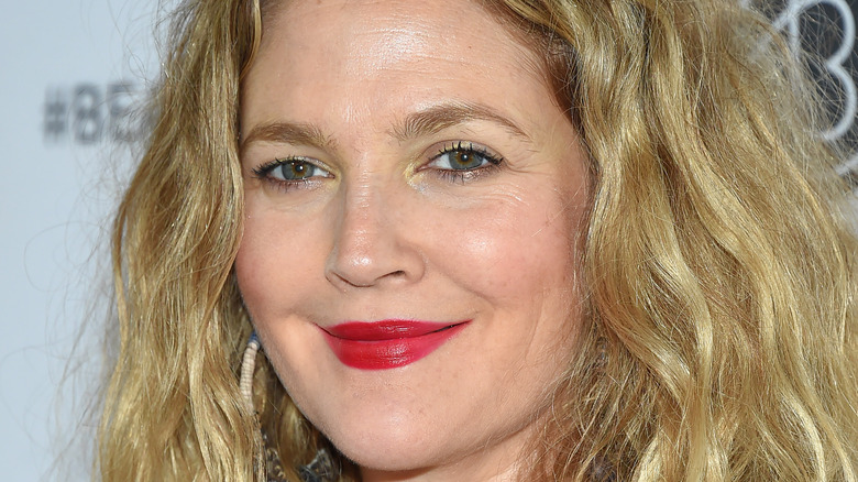 Drew Barrymore smiling at BeautyCon 2018 